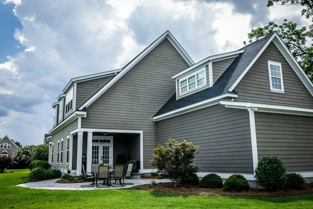 Two-story home with gray lap siding and white trim
